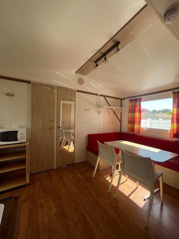 Mobil-Home Standard 26m² 2 chambres + terrasse (coté terre)